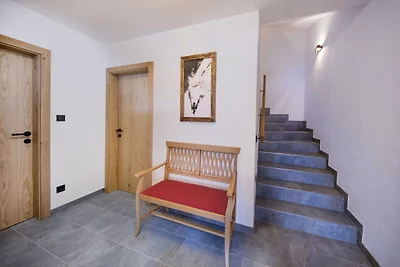 Luxe chalet met vier badkamers, bij een...