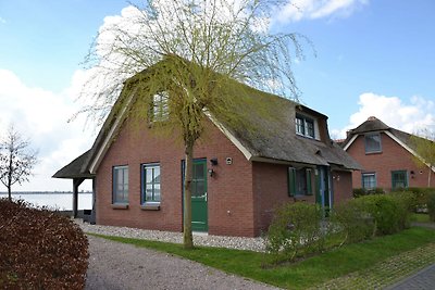 Stijlvolle rietgedekte villa met 2 badkamers ...