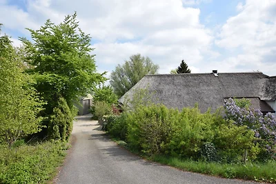 Bauernhaus in der Nהhe des Flusses in...