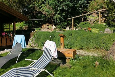 Blockhaus in Bayern mit überdachter Terrasse