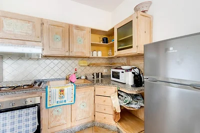 Mit privatem Garten und Klimaanlage