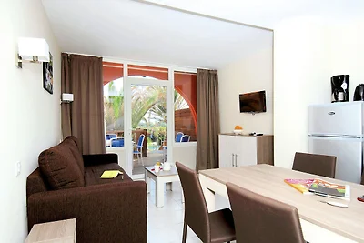 Apartment near beach in lively resort