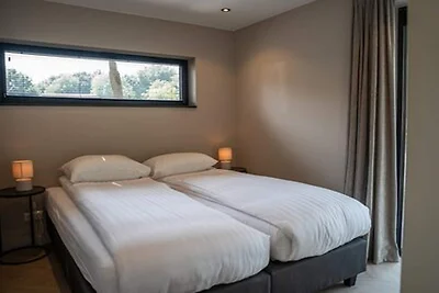 Luxuriöse Ökovilla mit Waldblick für 6...