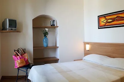 Appartamento con piscina e parcheggio