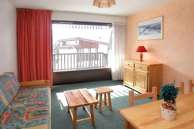 Slope-side apartment with balcony views