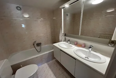 Appartement aan zee met terras