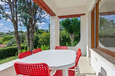 Gemütliches Ferienhaus mit Garten in Villaggi...