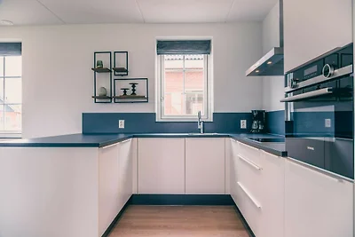 Sustainable water villa with dishwasher, by a...