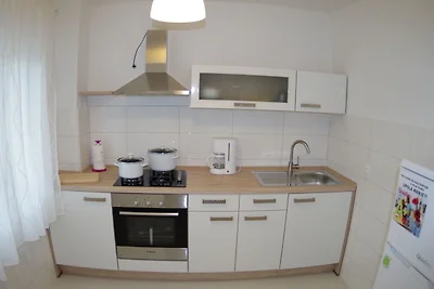 Wohnung in Rakalj mit Garten