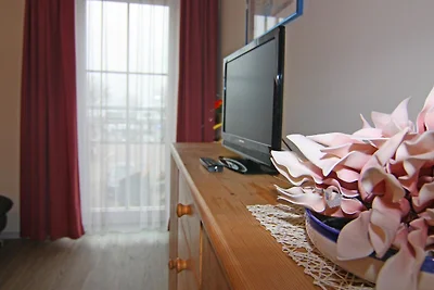 Appartement in Orth bij haven en vuurtoren
