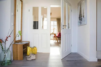 Casa con tetto di paglia sul Bodden con sauna