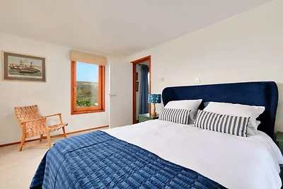 Cottage sul fiume con vista sull'estuario