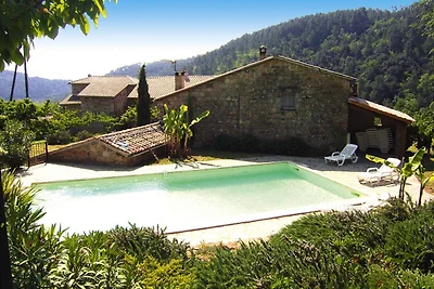 Casa in pietra con piscina in comune,...