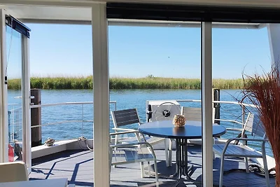 Drijvende lodge met terras in Lelystad