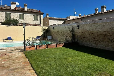 Apartment in a village with swimming pool
