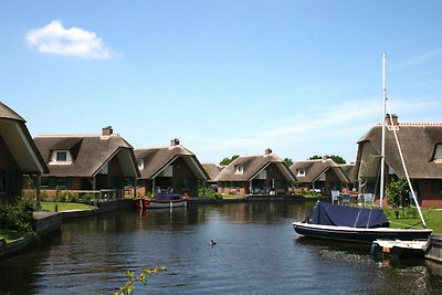 Stijlvolle rietgedekte villa met afwasmachine...