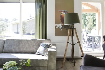 Bungalow mit einer überdachten Terrasse
