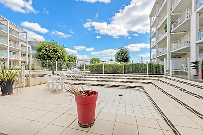 Strandappartement met zwembad