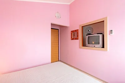 Moderna casa vacanze a Mandre con barbecue