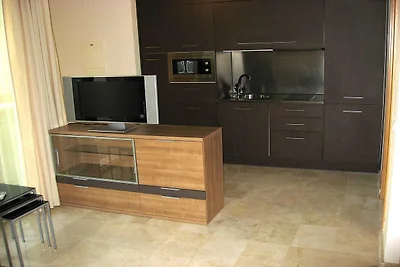 Appartement met uitzicht op het zwembad L'...
