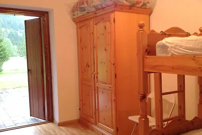 Grazioso chalet a Pozza di Fassa con giardino