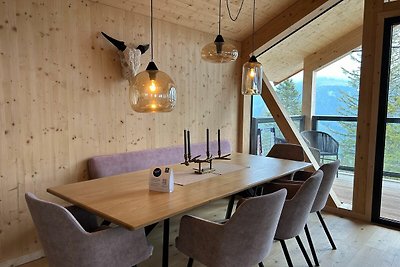 Chalet superior con sauna y jacuzzi.