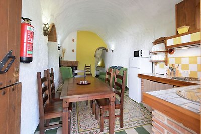 Cave house with private terrace on a small...