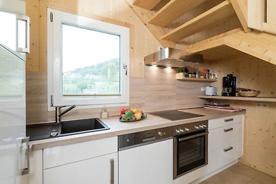 Chalet attraente con sauna