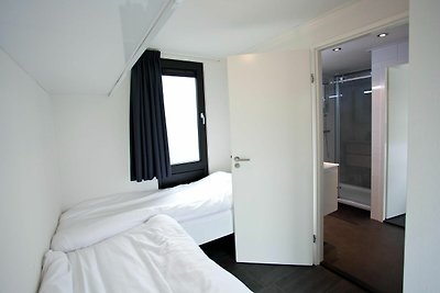 Modernes Ferienhaus mit Geschirrspüler in ein...