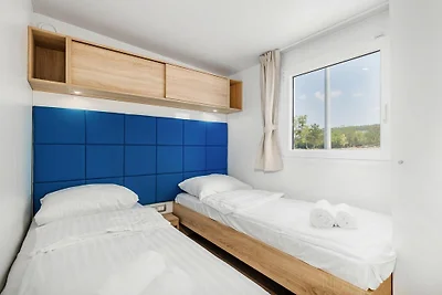 Mobilheim im Camping Omisal mit Pool