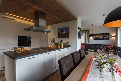Luxe chalet met vier badkamers, bij een...