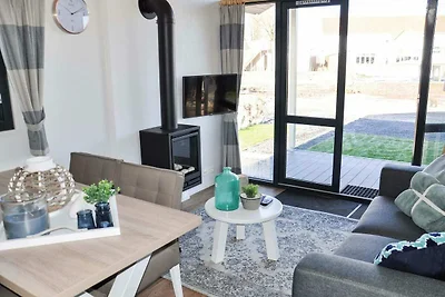 Lodge aan het meer met tuin