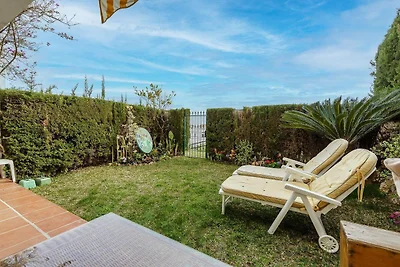 Appartement met tuin en gemeenschappelijk...