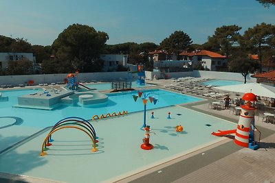 Mobilheim in Lido di Spina mit Wald