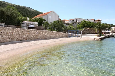 Wohnung in Grebatica mit Meeresstrand