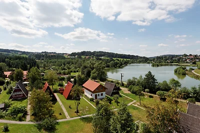 Chalet con terrazza vicino ad un lago...