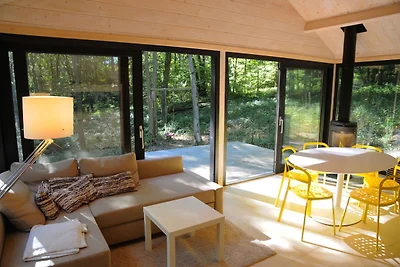 Chalet moderno situato nel bosco