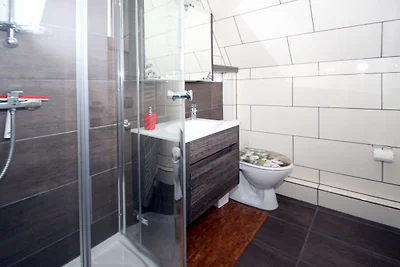 Ferienhaus Toms Hütte mit Terrasse in Dornum