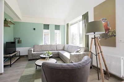 Bungalow mit einer überdachten Terrasse