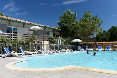 Appartement met terras bij strand