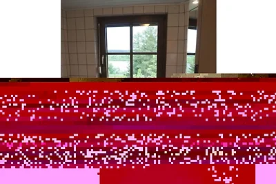 Huis aan de oever van het meer