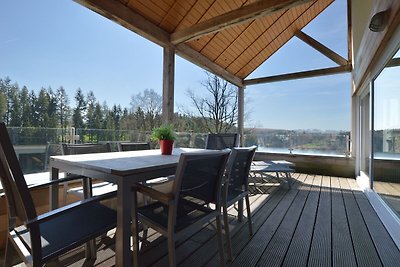 Luxe appartement met sauna boven een meer