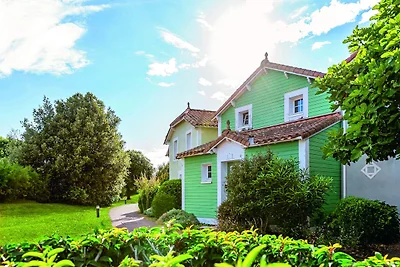 Haus an der Küste mit Spielbereich