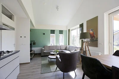 Bungalow mit einer überdachten Terrasse