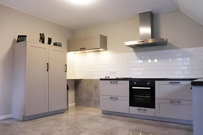 Zeer ruim appartement in verbouwde boerderij