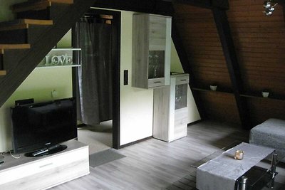 Freistehender Holz-Bungalow mit Terrasse in e...