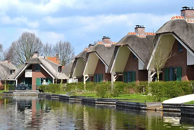 Schön reetgedeckte Villa mit ein Geschirrspül...
