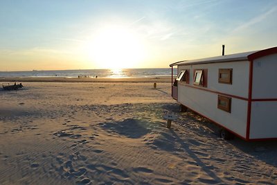 Accogliente chalet con veranda sulla spiaggia