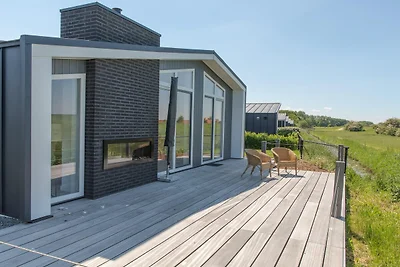 Bellissimo chalet con caminetto decorativo