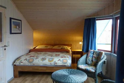 Cottage sul prato sul lago